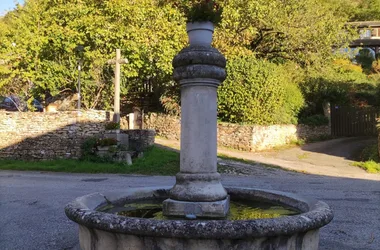 Round fountain in Vernas, commune of Balcons du Dauphiné