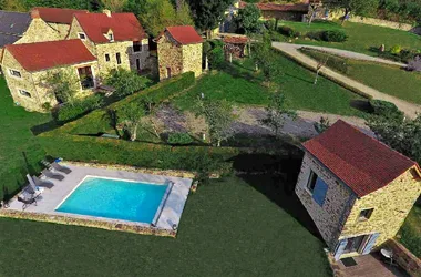 the house, its 2 dovecotes and its swimming pool