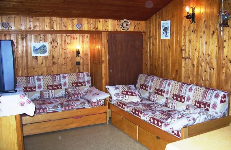 Salón con sofás cama