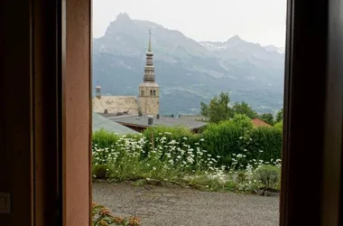 View of Aiguilles de Warrens and bell tower