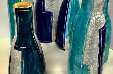 stoneware bottles with enamel decorations